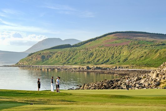 Shiskine Golf Club. 4th green and Kings Caves