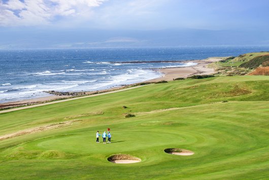 Shiskine Golf Club, Isle of Arran. 12th green & hand shakes.